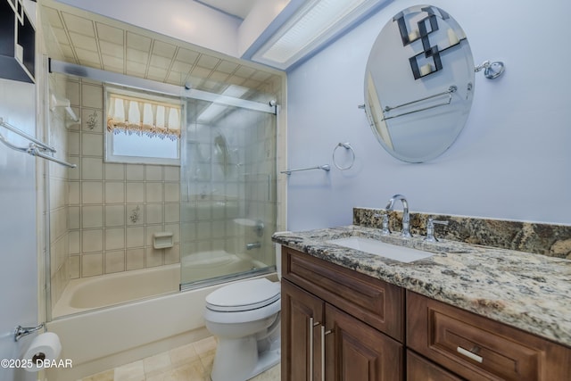 bathroom with enclosed tub / shower combo, toilet, vanity, and tile patterned flooring