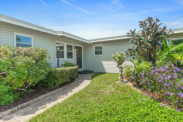 exterior space featuring a front lawn