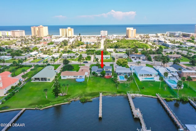 birds eye view of property featuring a water view