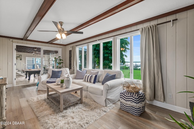 living room featuring beamed ceiling, pool table, ceiling fan, hardwood / wood-style floors, and crown molding