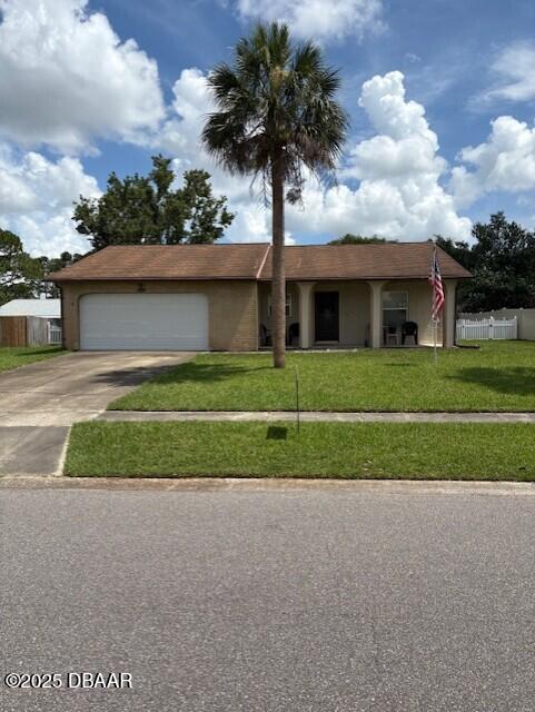 1229 Mellisa Dr, Port Orange, FL 32129 - single story home featuring driveway and an attached garage