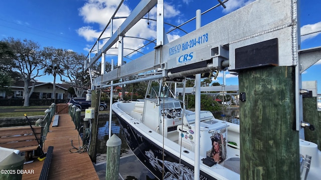 view of dock featuring boat lift