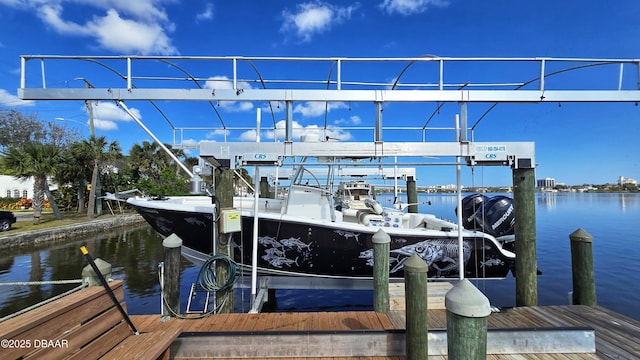 dock area featuring a water view and boat lift