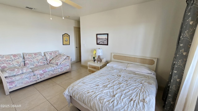 bedroom featuring visible vents, a ceiling fan, and tile patterned flooring