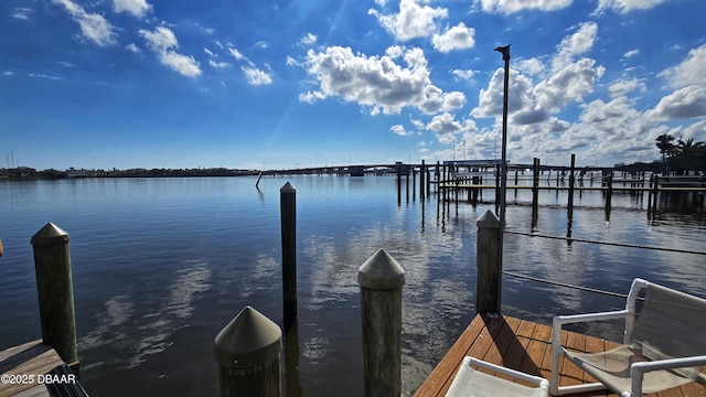 view of dock with a water view