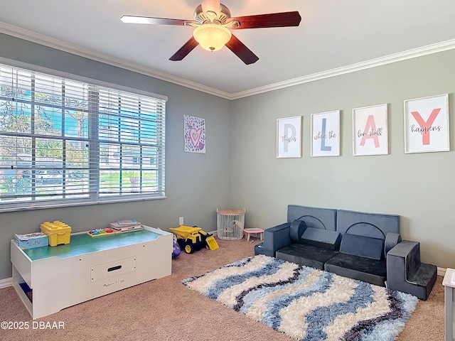 bedroom with carpet, crown molding, and ceiling fan