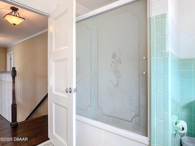 bathroom featuring hardwood / wood-style floors and crown molding