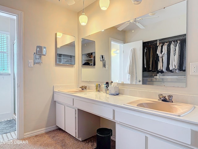 bathroom featuring vanity and ceiling fan