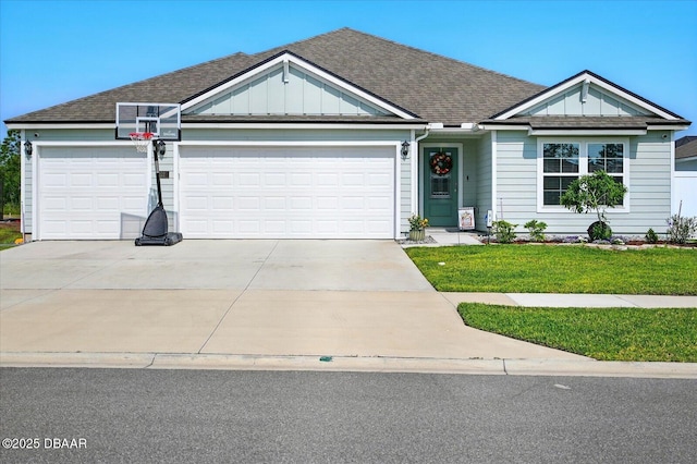 52 Lumber Jack Trl, Palm Coast, FL 32137 - single story home featuring an attached garage, driveway, a front lawn, and board and batten siding