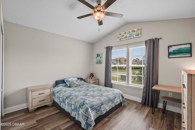 52 Lumber Jack Trl, Palm Coast, FL 32137 - bedroom featuring vaulted ceiling, baseboards, dark wood-style floors, and a ceiling fan