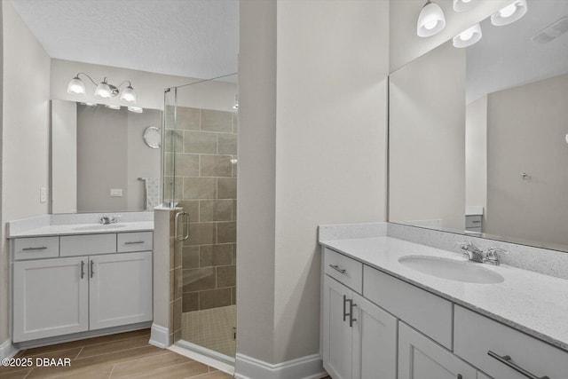 52 Lumber Jack Trl, Palm Coast, FL 32137 - full bath featuring a stall shower, vanity, baseboards, and wood finished floors