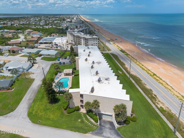 bird's eye view with a view of the beach and a water view