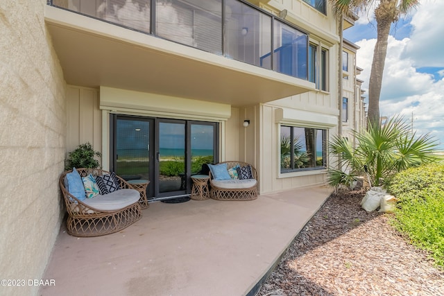 entrance to property with a patio