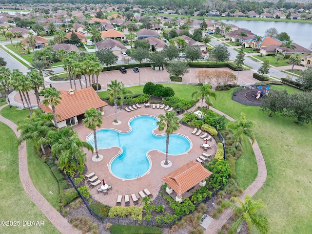 birds eye view of property featuring a water view