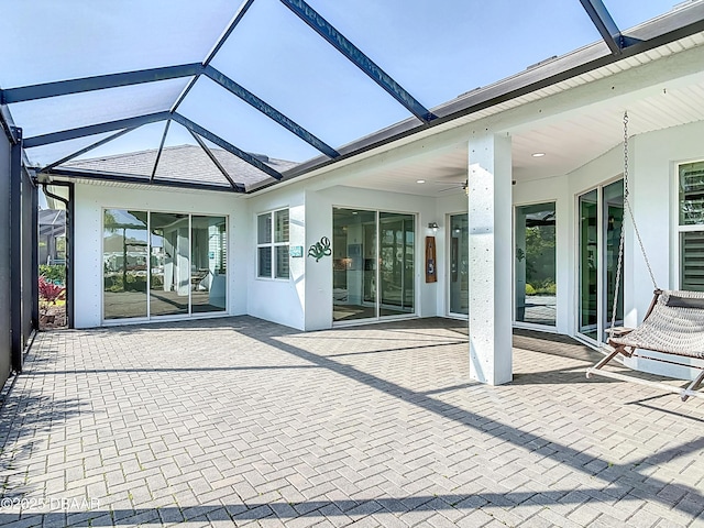 182 Island Breeze Ave, Daytona Beach, FL 32124 - view of patio / terrace featuring glass enclosure and ceiling fan