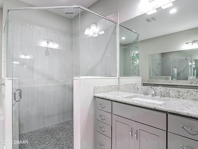 182 Island Breeze Ave, Daytona Beach, FL 32124 - bathroom featuring a shower stall and vanity