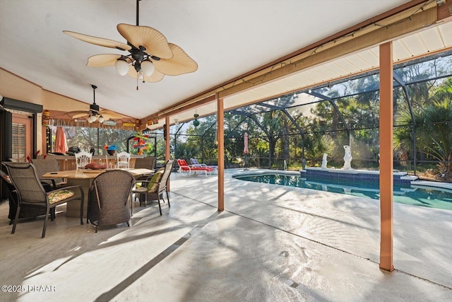 view of pool featuring a lanai, a patio area, and ceiling fan