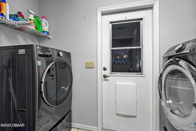 washroom featuring washer / clothes dryer