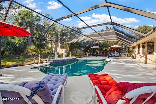 view of swimming pool featuring glass enclosure and a patio area