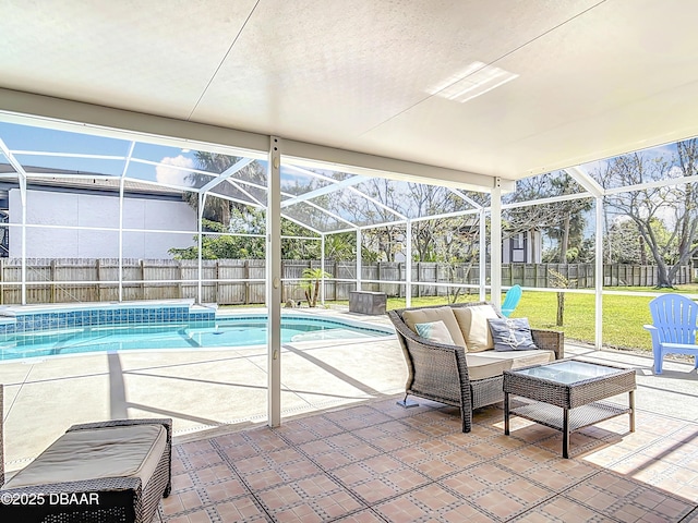 view of pool with glass enclosure, a patio, a fenced in pool, an outdoor living space, and a fenced backyard