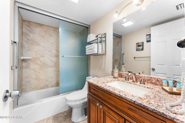 2625 S Atlantic Ave Unit 18Nw, Daytona Beach Shores, FL 32118 - full bathroom featuring tile patterned flooring, toilet, vanity, and shower / washtub combination
