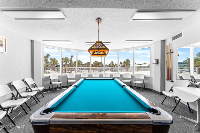 2625 S Atlantic Ave Unit 18Nw, Daytona Beach Shores, FL 32118 - recreation room featuring a textured ceiling, baseboards, and billiards table