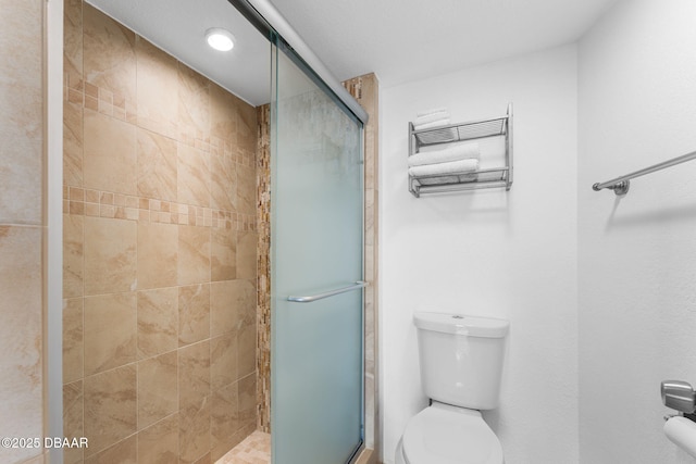 2625 S Atlantic Ave Unit 18Nw, Daytona Beach Shores, FL 32118 - bathroom featuring toilet, a stall shower, and recessed lighting