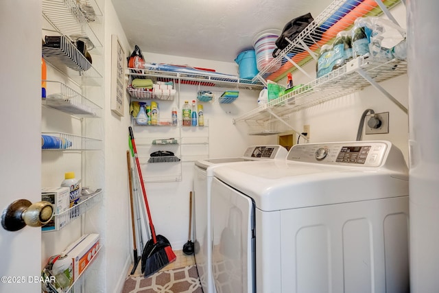 4139 S Atlantic Ave Unit A 302, New Smyrna Beach, FL 32169 - clothes washing area featuring washer and clothes dryer