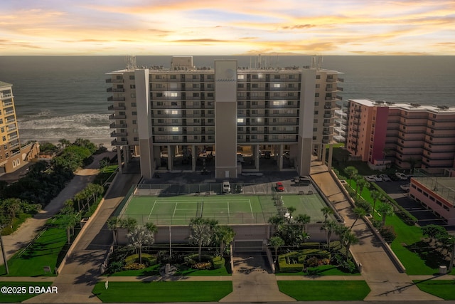 4139 S Atlantic Ave Unit A 302, New Smyrna Beach, FL 32169 - aerial view at dusk of a water view and a view of apartment building / complex