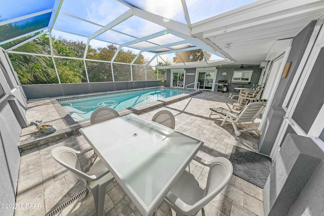 view of pool featuring a patio and a lanai