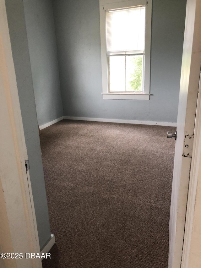 161 W 2nd Ave, Pierson, FL 32180 - empty room with carpet flooring and baseboards
