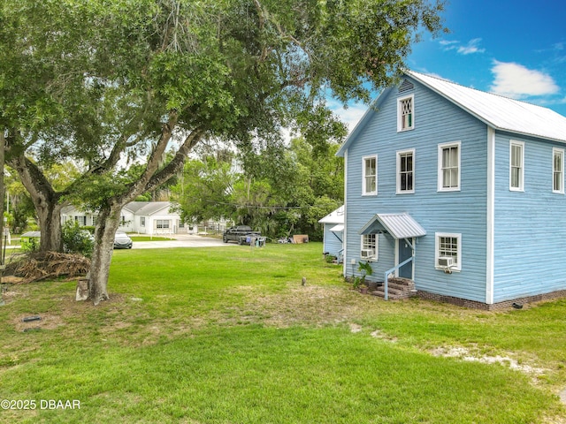 161 W 2nd Ave, Pierson, FL 32180 - view of property exterior with entry steps and a lawn