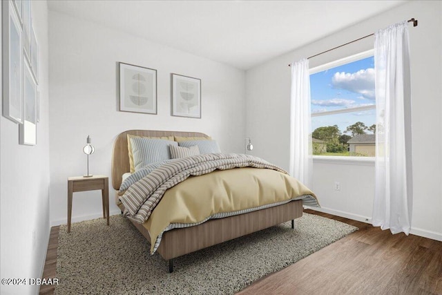 bedroom featuring wood-type flooring