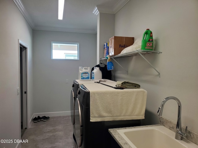 580 Barefoot Life Ln, Daytona Beach, FL 32124 - washroom with ornamental molding, a sink, separate washer and dryer, laundry area, and baseboards