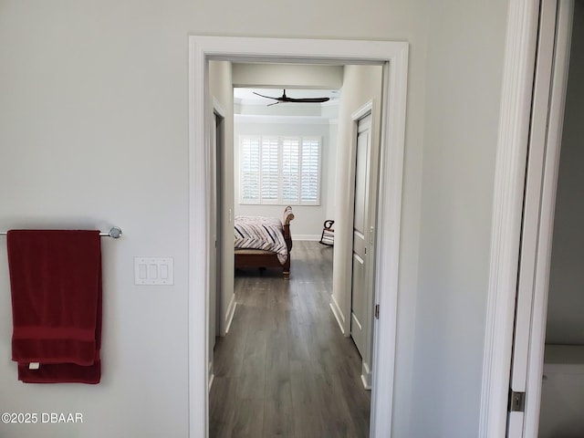 580 Barefoot Life Ln, Daytona Beach, FL 32124 - hallway featuring dark wood-style floors and baseboards
