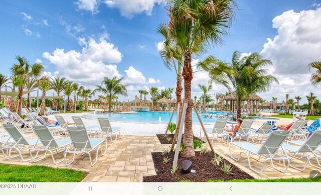 580 Barefoot Life Ln, Daytona Beach, FL 32124 - pool with a patio