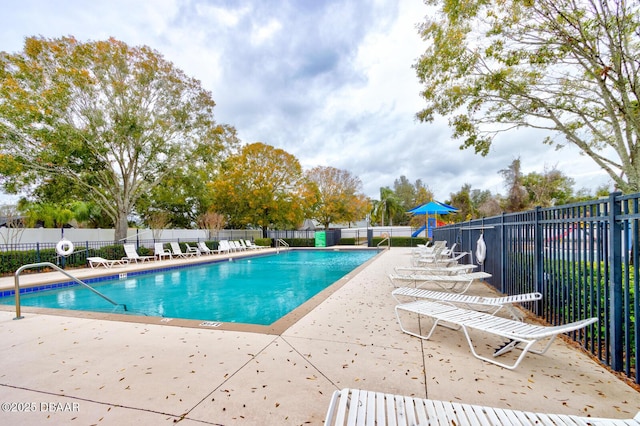 view of pool featuring a patio area