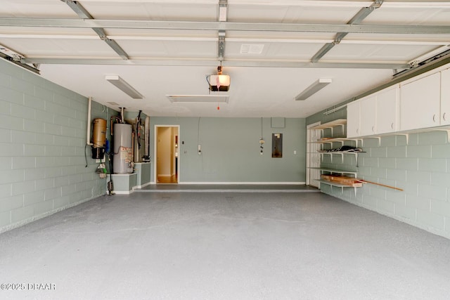 garage with electric panel, gas water heater, and a garage door opener