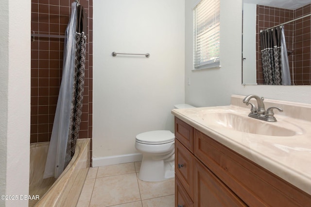full bath with tiled shower / bath, tile patterned floors, vanity, and toilet