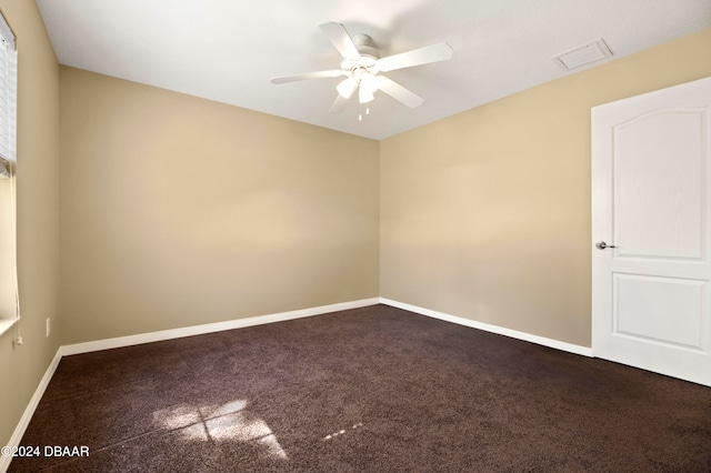 unfurnished room featuring carpet and ceiling fan