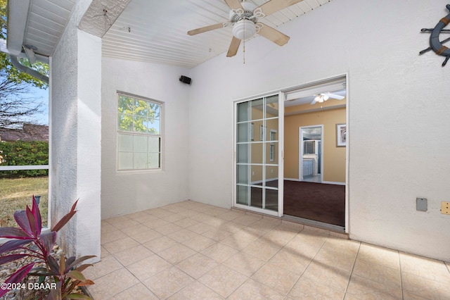 view of patio featuring ceiling fan