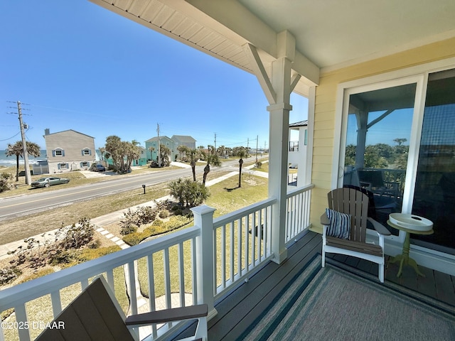 2948 N Ocean Shore Blvd, Flagler Beach, FL 32136 - balcony with a porch