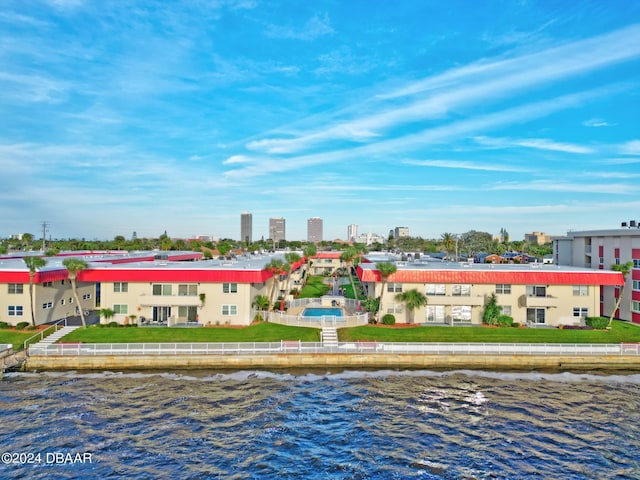 birds eye view of property featuring a water view