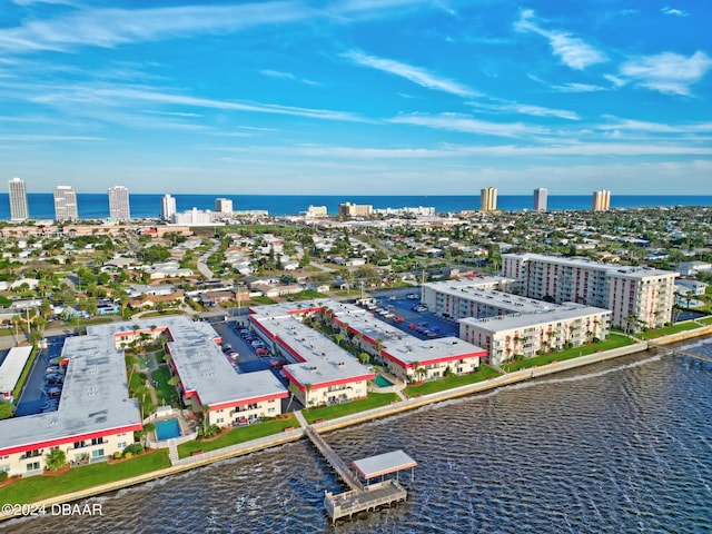 drone / aerial view with a water view