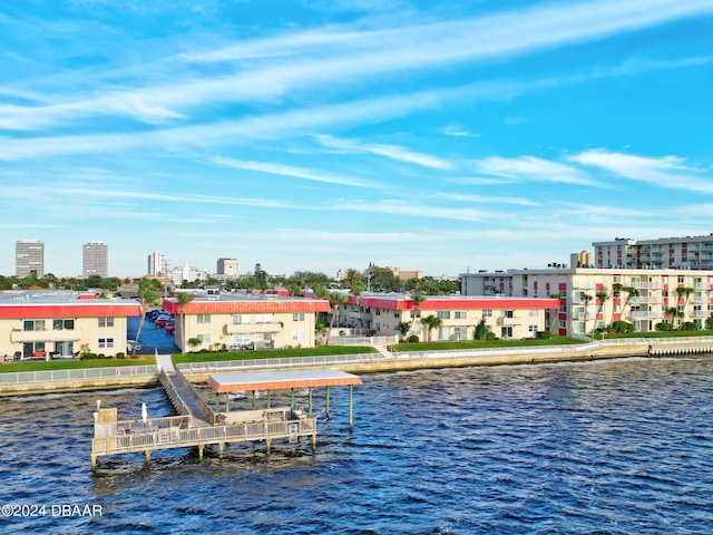 dock area with a water view