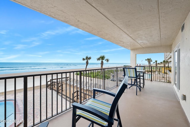 3807 S Atlantic Ave Unit 203, Daytona Beach, FL 32118 - balcony featuring view of water and beach