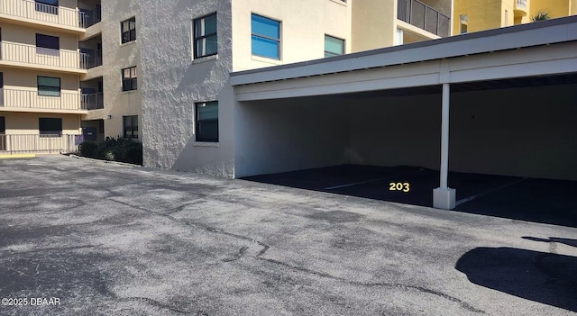 3807 S Atlantic Ave Unit 203, Daytona Beach, FL 32118 - view of covered parking lot
