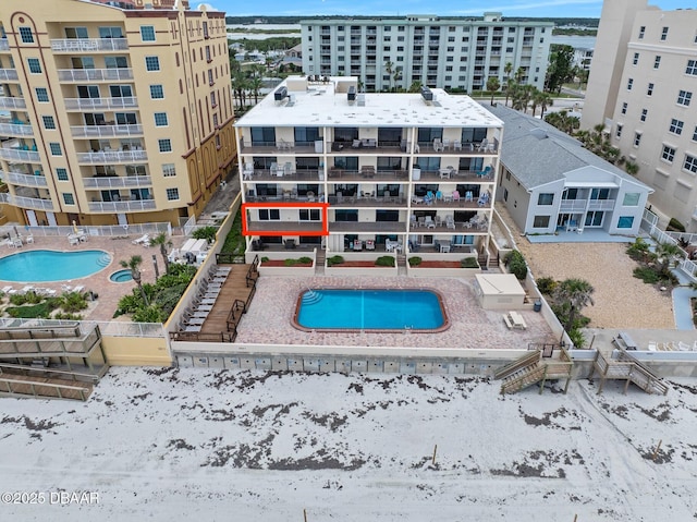 3807 S Atlantic Ave Unit 203, Daytona Beach, FL 32118 - bird's eye view of a pool area and apartment complex