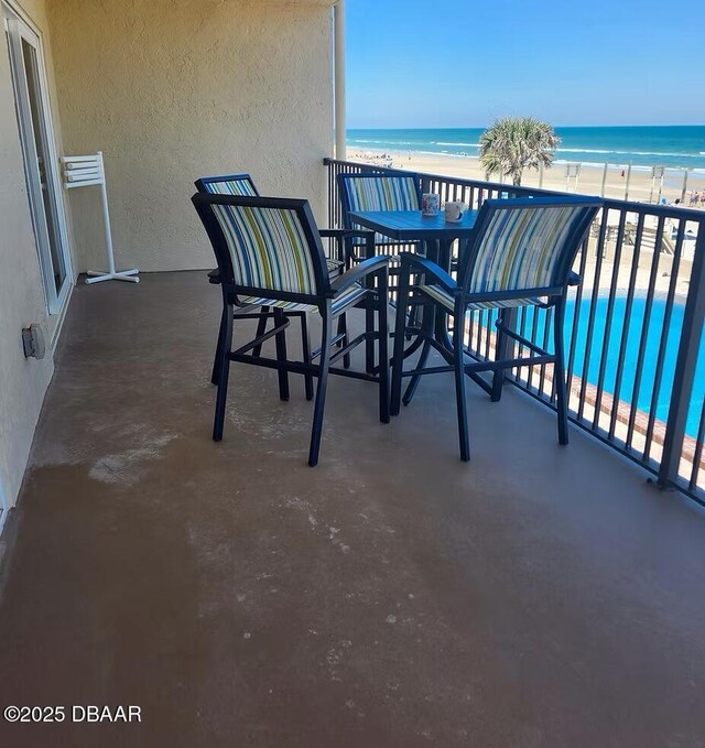 3807 S Atlantic Ave Unit 203, Daytona Beach, FL 32118 - balcony featuring view of water and beach