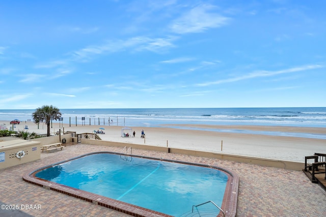 3807 S Atlantic Ave Unit 203, Daytona Beach, FL 32118 - community pool with view of water and beach